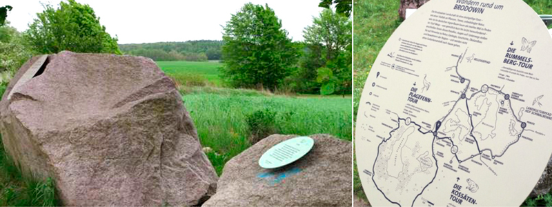 Bild links: Sehr große Steine mit Schildern. Bild rechts: Eine Karte für einen Rundwanderweg.